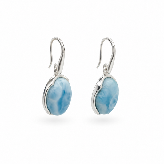 Oval Larimar earrings in sterling silver, angled view on white background.