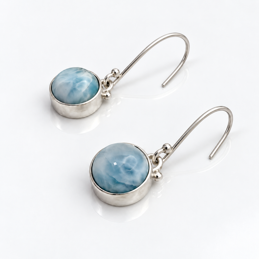 Round Larimar sterling silver drop earrings, right angled view showing bezel depth and open ear wires.