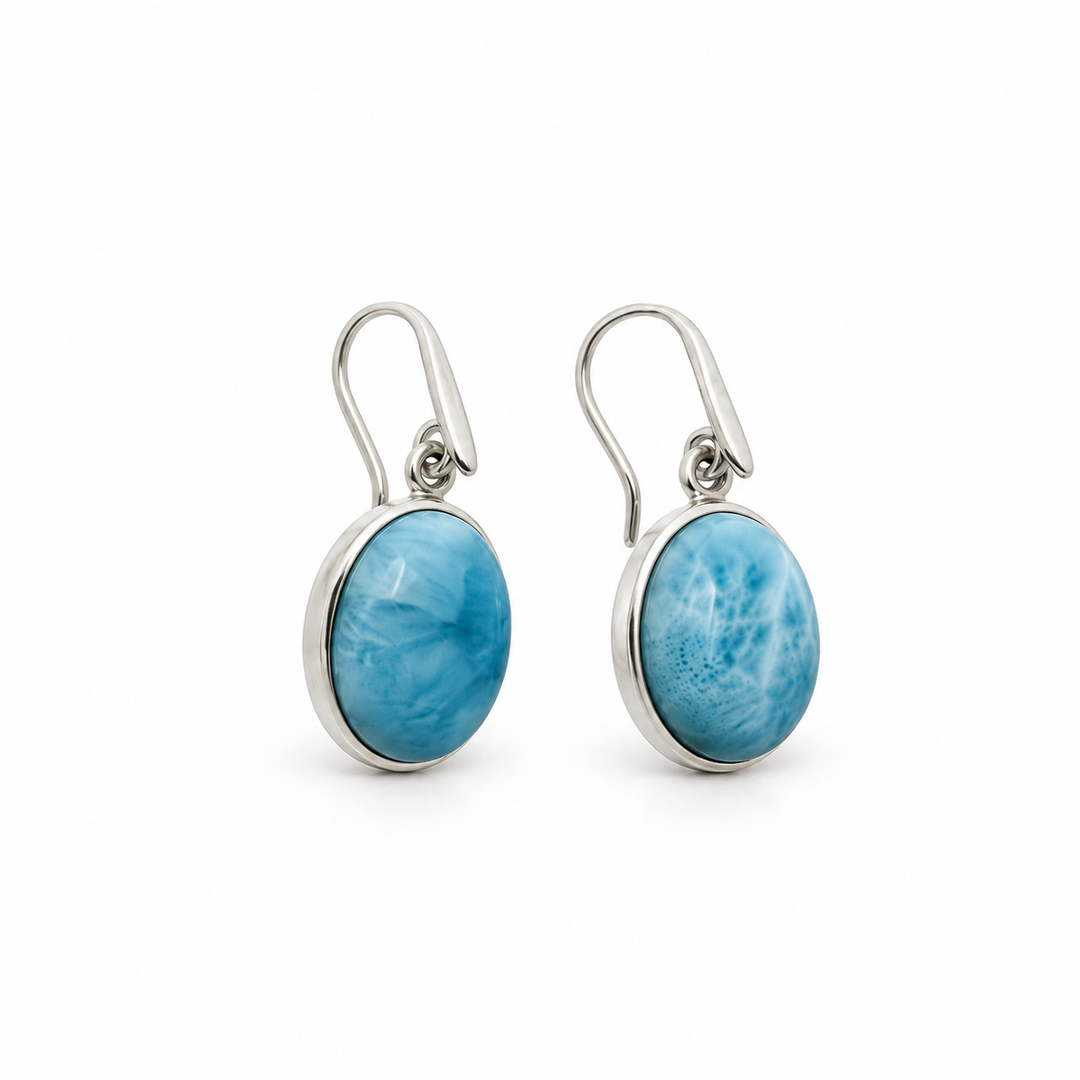 Oval Larimar drop earrings in sterling silver, upright front view on glossy white