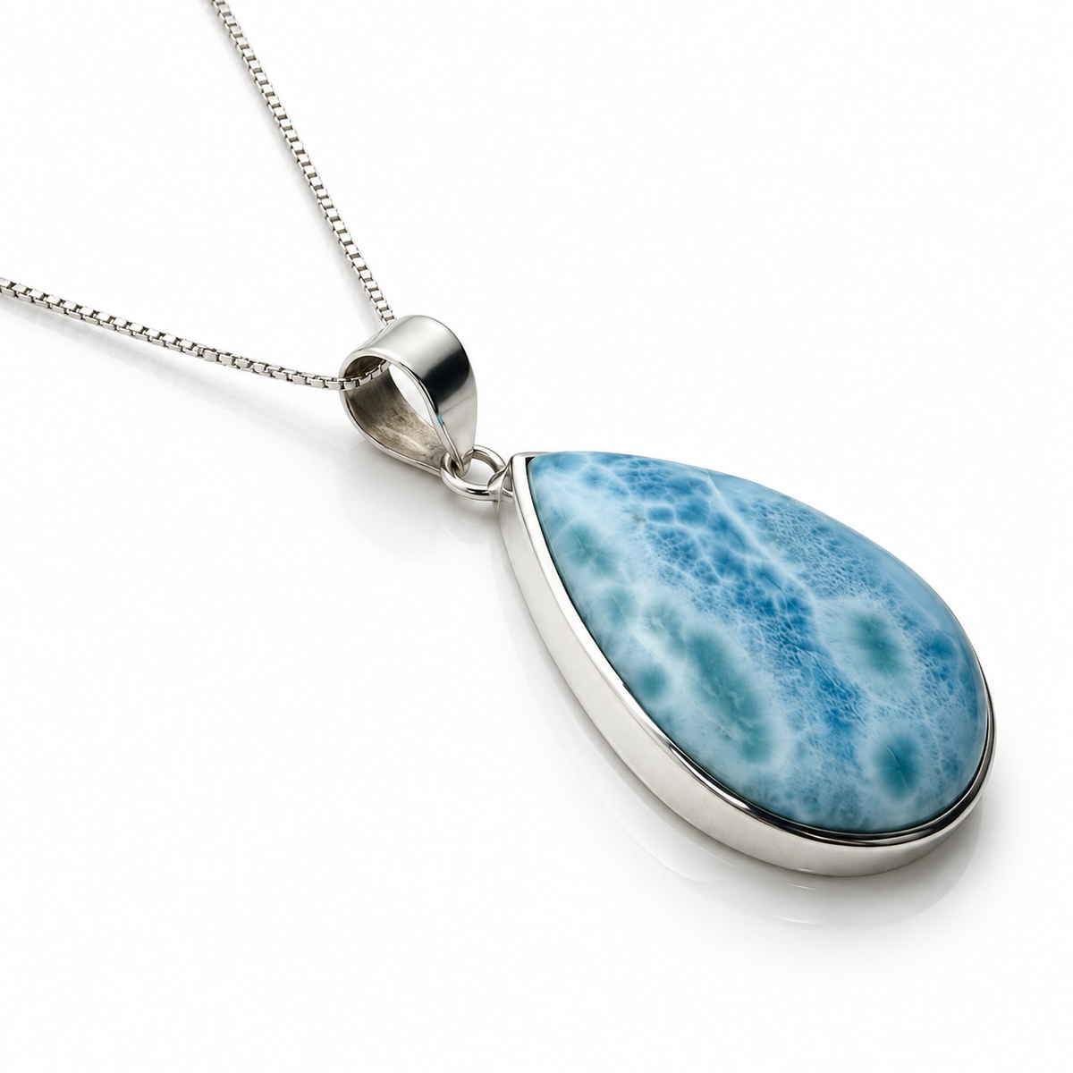 Elongated teardrop Larimar necklace in sterling silver, angled view