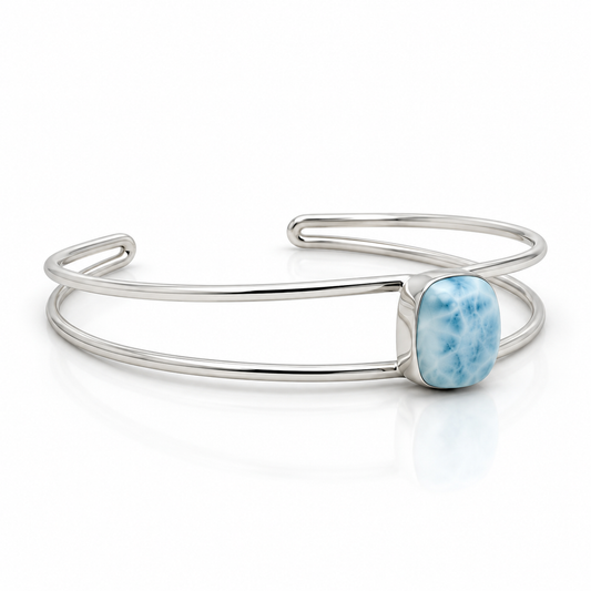 Cushion-shaped Larimar sterling silver double-wire cuff bracelet, right angled view on glossy white
