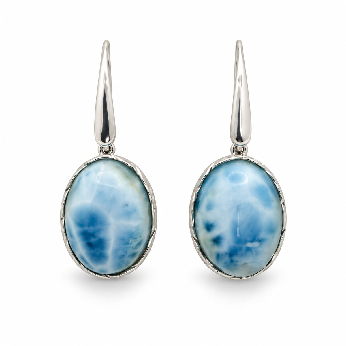 Front view of oval Larimar earrings with tapered silver earwires and textured silver rims.
