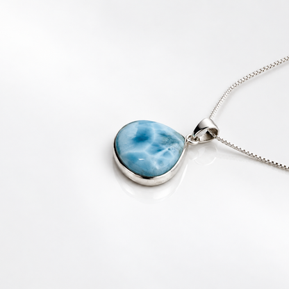 Larimar Blue Nebula necklace, side profile on glossy white