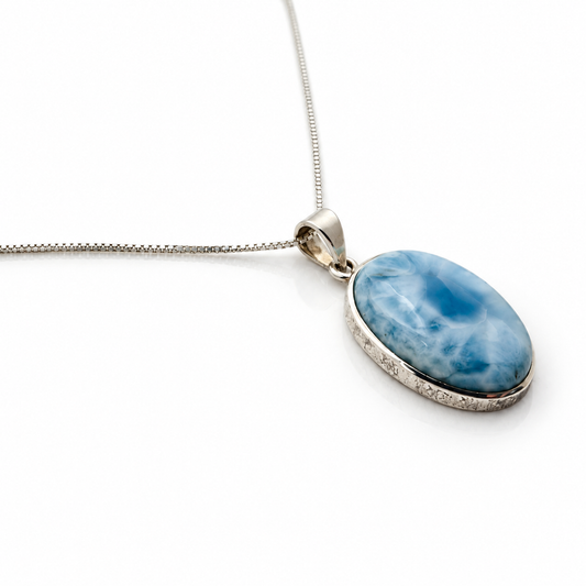 Larimar Blue Reverie necklace angled view showing the sterling silver bezel and bail