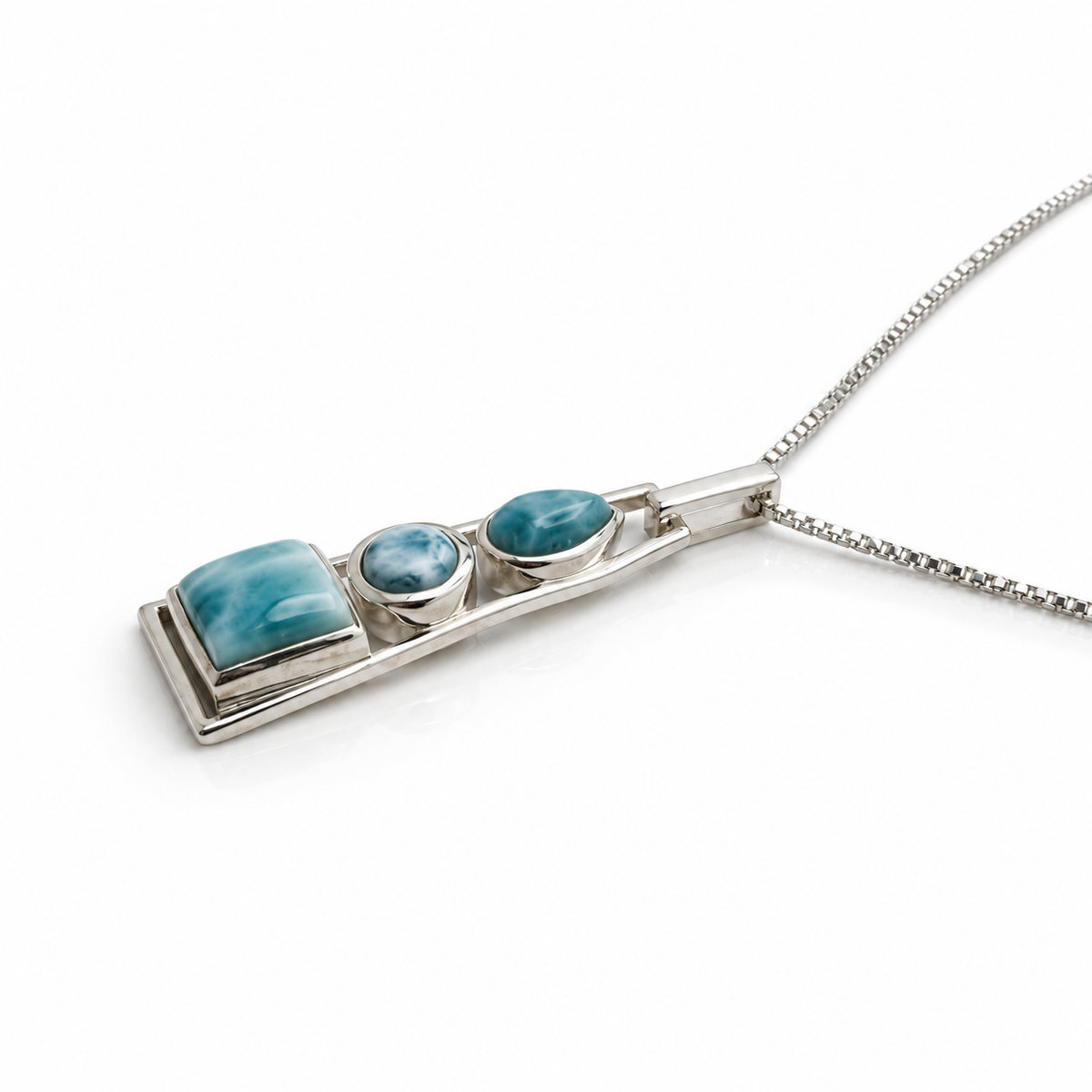 Three-stone Larimar necklace in sterling silver, low side profile