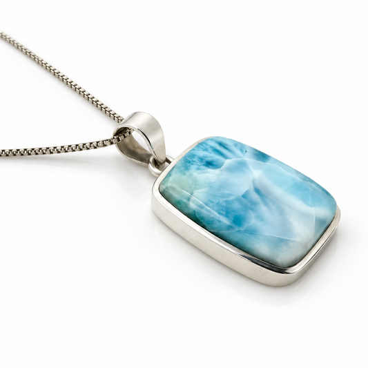 Rectangular Larimar necklace in sterling silver, angled view on glossy white