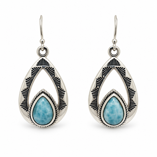 Larimar teardrop earrings with open engraved sterling silver frames and rope borders, front view.