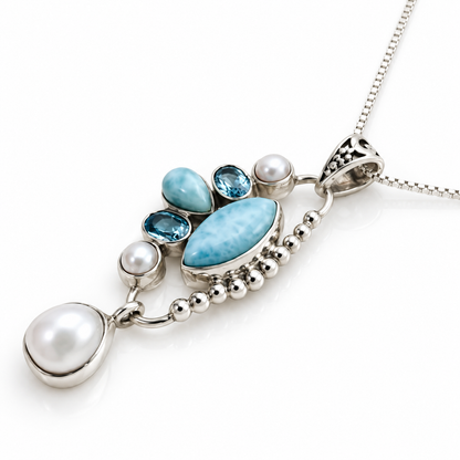 Larimar, blue gemstone and pearl sterling silver necklace, side profile view