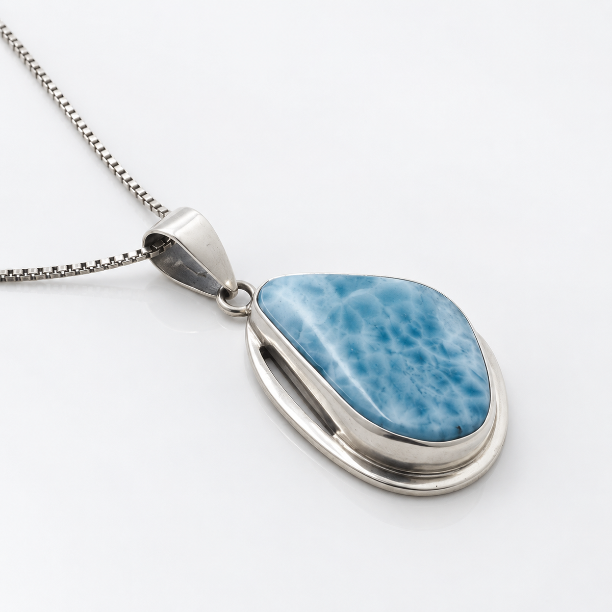Larimar pendant low angled view on white background