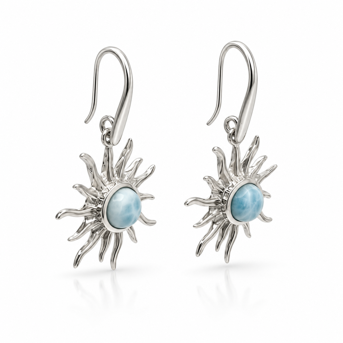 Larimar sunburst earrings in polished sterling silver, angled view on white.