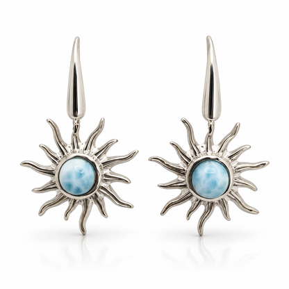 Larimar sunburst earrings with wavy sterling silver rays, front view on white.