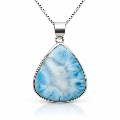 Front view of blue and white teardrop Larimar necklace on glossy white
