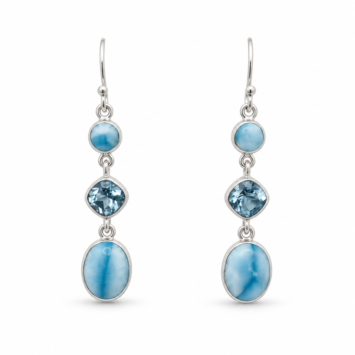 Three-stone drop earrings with round Larimar, faceted blue cushion stones and oval Larimar in sterling silver, front view.