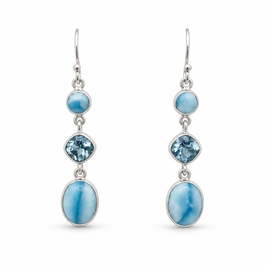 Three-stone drop earrings with round Larimar, faceted blue cushion stones and oval Larimar in sterling silver, front view.