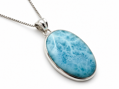 Large oval Larimar necklace left angled view on white