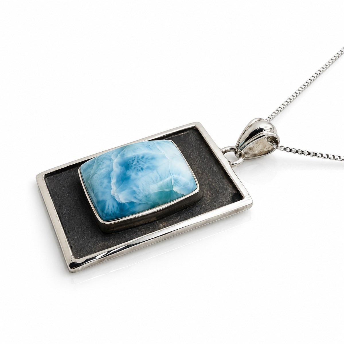 Ocean Tableau Larimar necklace showing raised stone and sterling side profile
