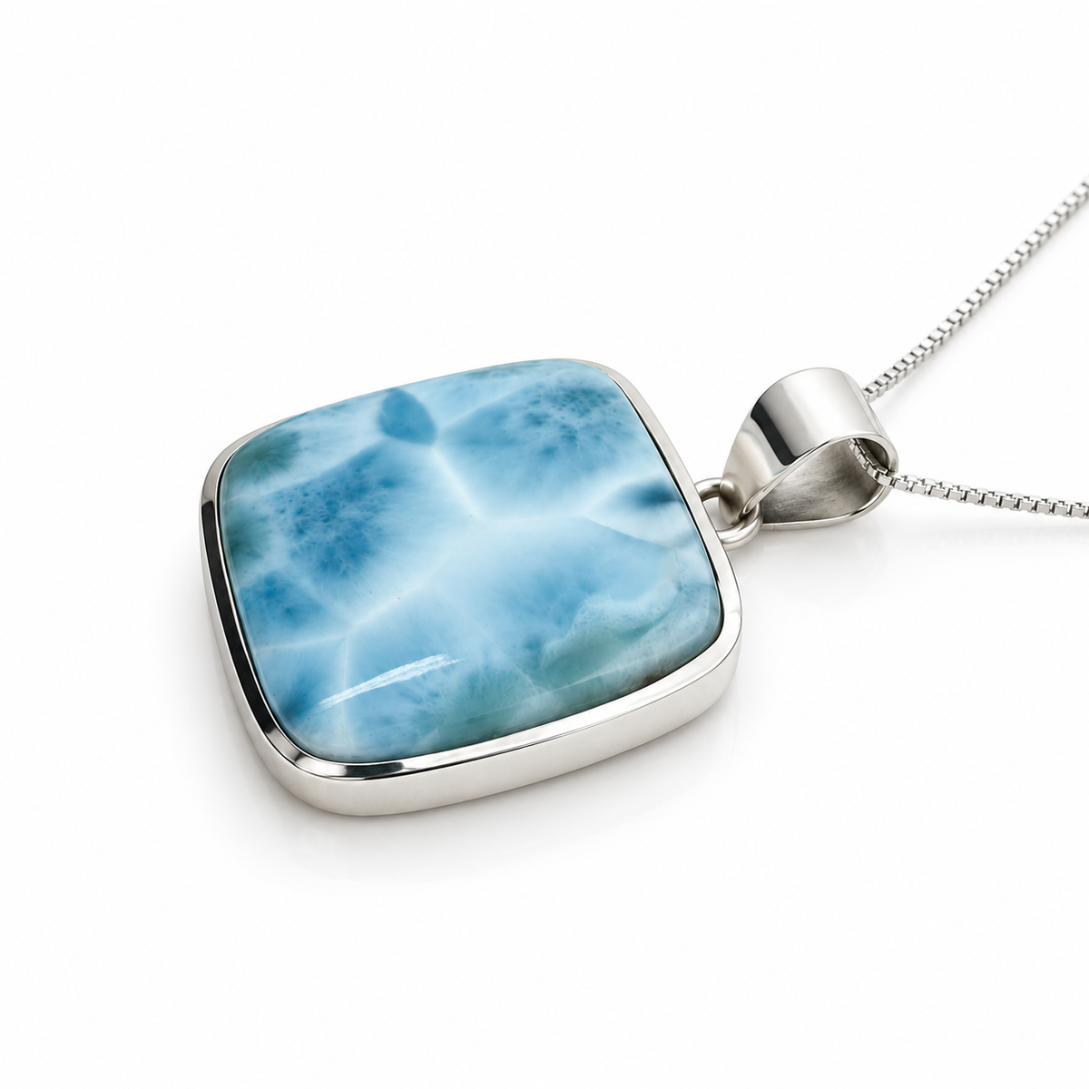 Rounded-square Larimar necklace in sterling silver, low side-profile view on glossy white