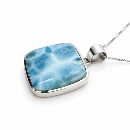 Rounded-square Larimar necklace in sterling silver, low side-profile view on glossy white