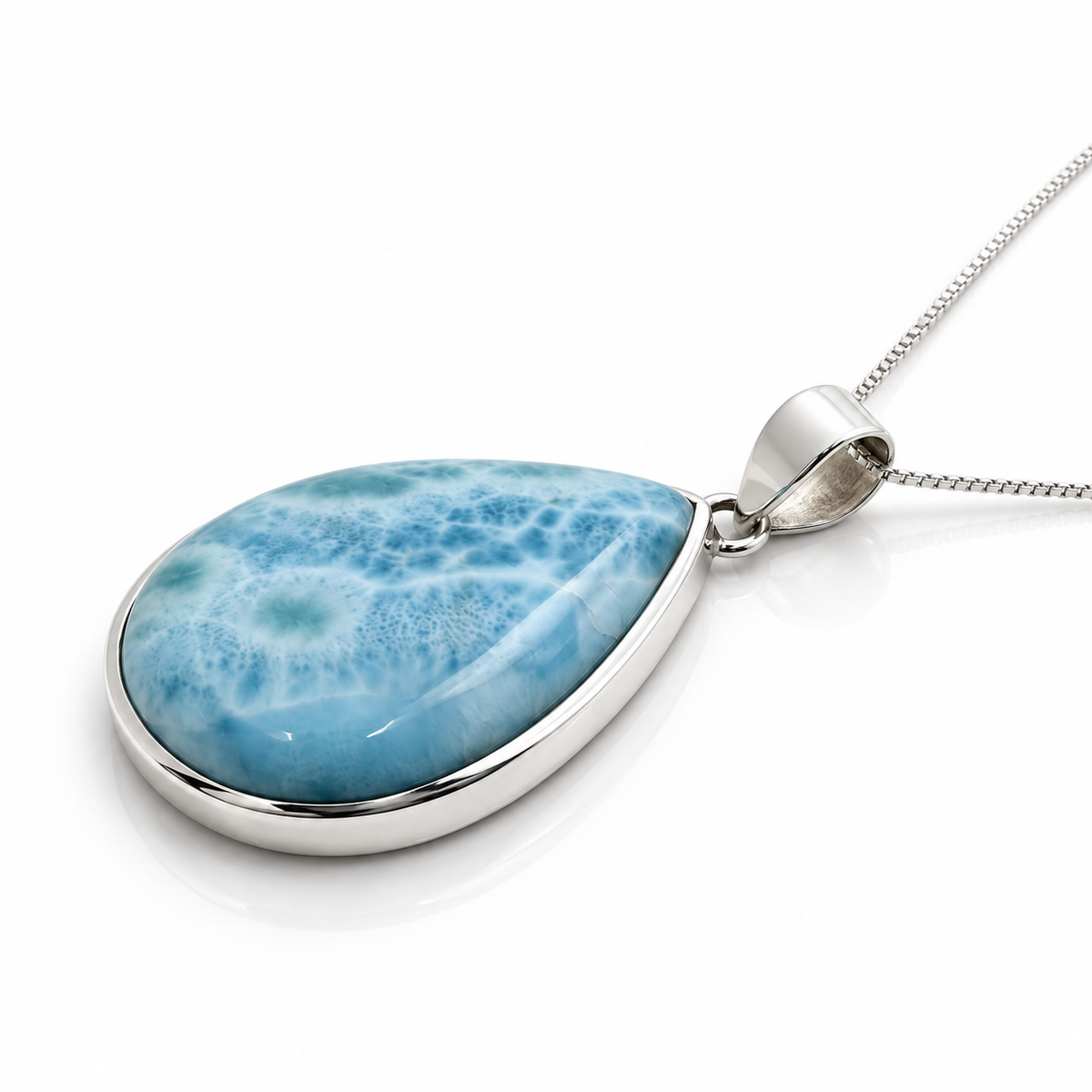 Elongated teardrop Larimar necklace showing sterling silver side profile